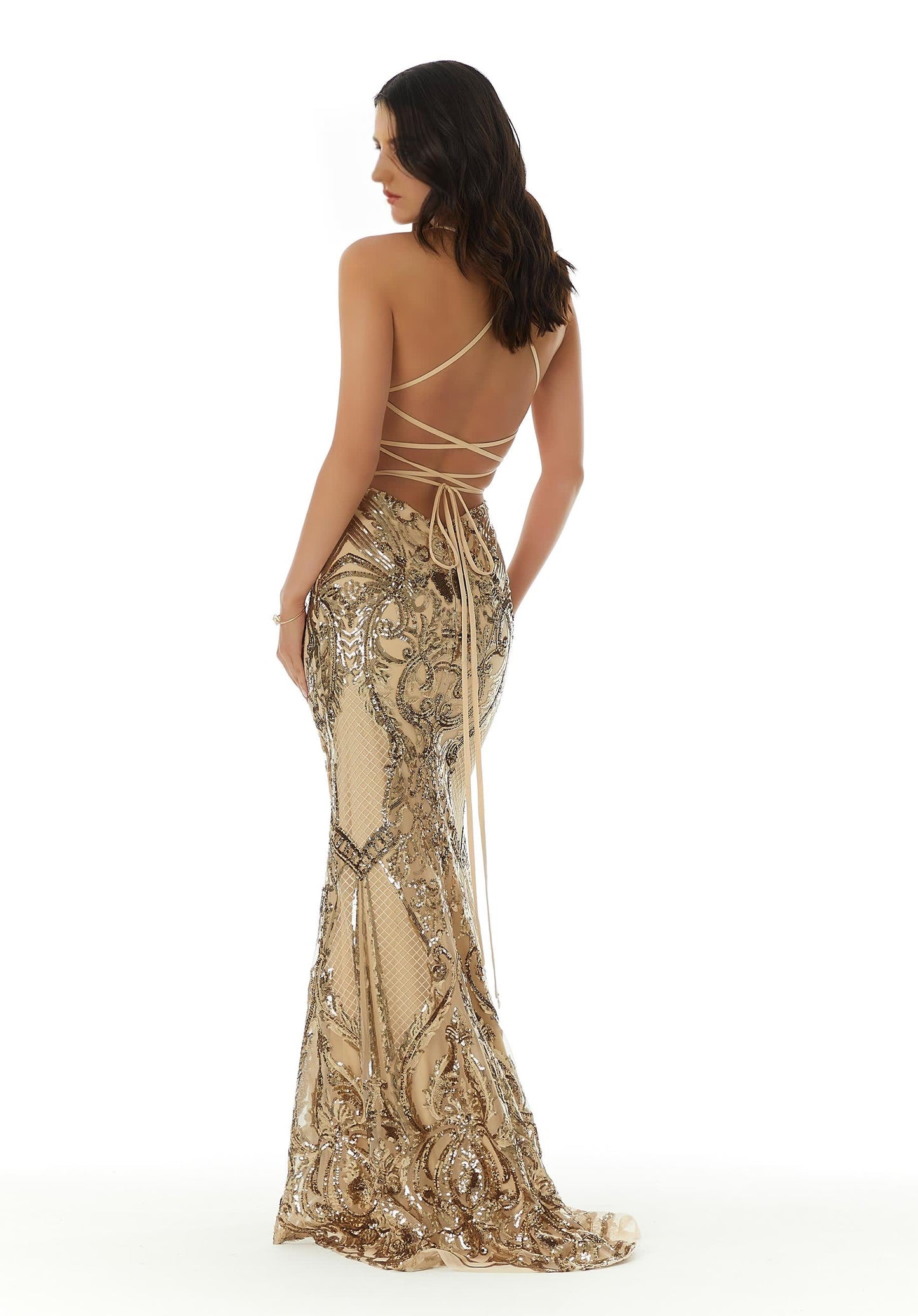 Gorgeous long fitted gown with glimmering patterned sequins and crossing tie strap detail.